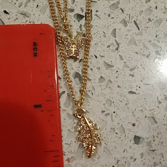Gold costume necklace, with 2 length chain. - Picture 4 of 4